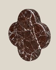 ALHAMBRA Door Knob by ATOMS in Burgundy, angled view showing the rounded stone edge and natural mineral pattern.