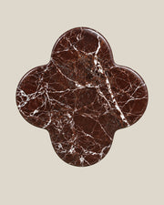 ALHAMBRA Door Knob by ATOMS in Burgundy, front view of the four-lobed natural stone face.