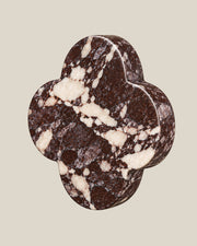 ALHAMBRA Door Knob by ATOMS in Red, angled view showing the rounded stone edge and natural mineral pattern.