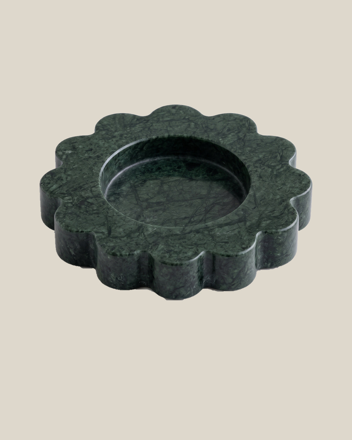 ATOMS Mini Sun Tray in Verde Marble, three-quarter view on BONE background; 12.5 cm diameter and 2 cm thick.
