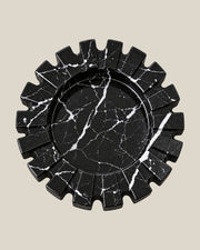 Aston Ash Tray in Spanish Black Marble, high-angle view of its circular centre and natural white veining.