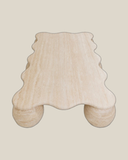 MIRA Large Beige Travertine coffee table — product view on Bone background