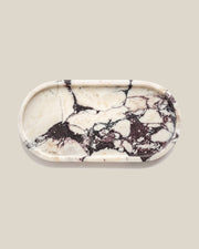 ATOMS OVAL Tray Calacatta Viola marble, top view on a BONE background