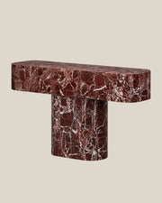 BUTTER console table by CARVINGS in Rosso Levante Marble, on a BONE background, right view.