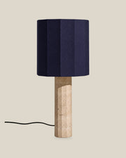 Roma Table Lamp, Large Faceted, Travertine Beige + Dark Blue, on a bone background.