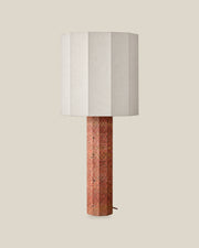 Roma Table Lamp, Large Faceted, Travertine Red + White, front hero view on bone background.