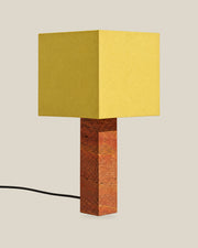 Roma Table Lamp, Large Square, Travertine Red + Yellow, on a bone background.