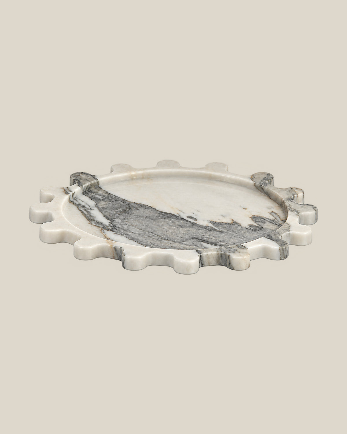 Sun Orbit Tray in Limited Edition Calacatta Borghini natural marble, low front view, rounded sun rays and recessed circular centre.
